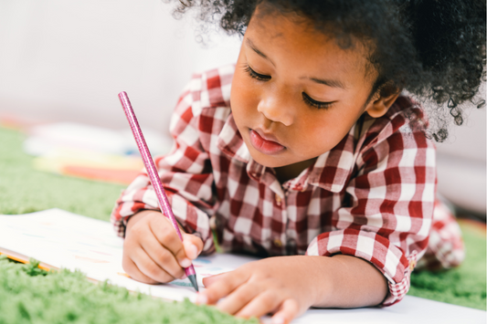young-girl-writing-preparing-for-school