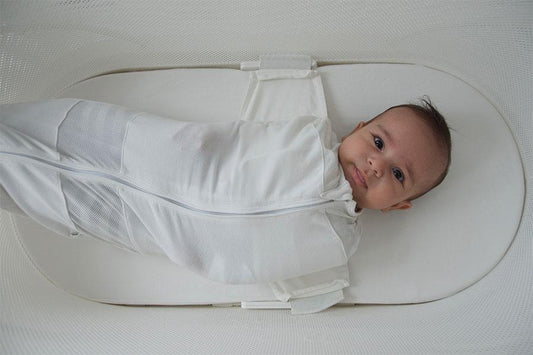 swaddling lowers SIDS risk; swaddle baby