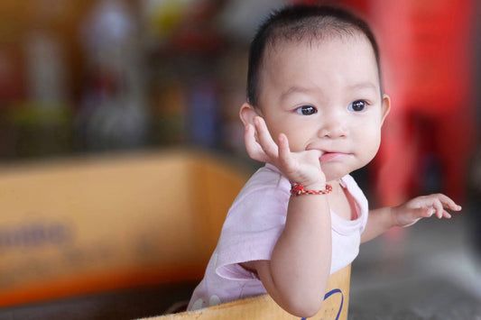 Toddler sucking on thumb