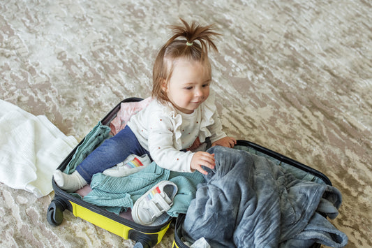 Toddler preparing for travel